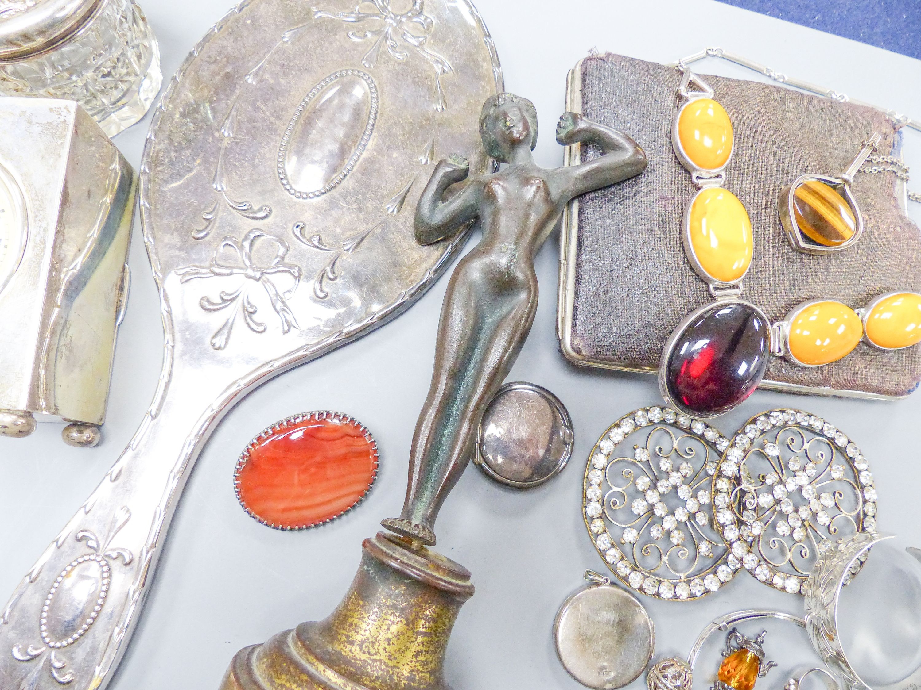A George V silver cased carriage timepiece, London, 1926, 9cm and other assorted collectables including costume jewellery, amber necklace, etc.